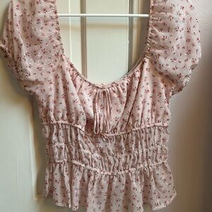 pink ruched floral blouse